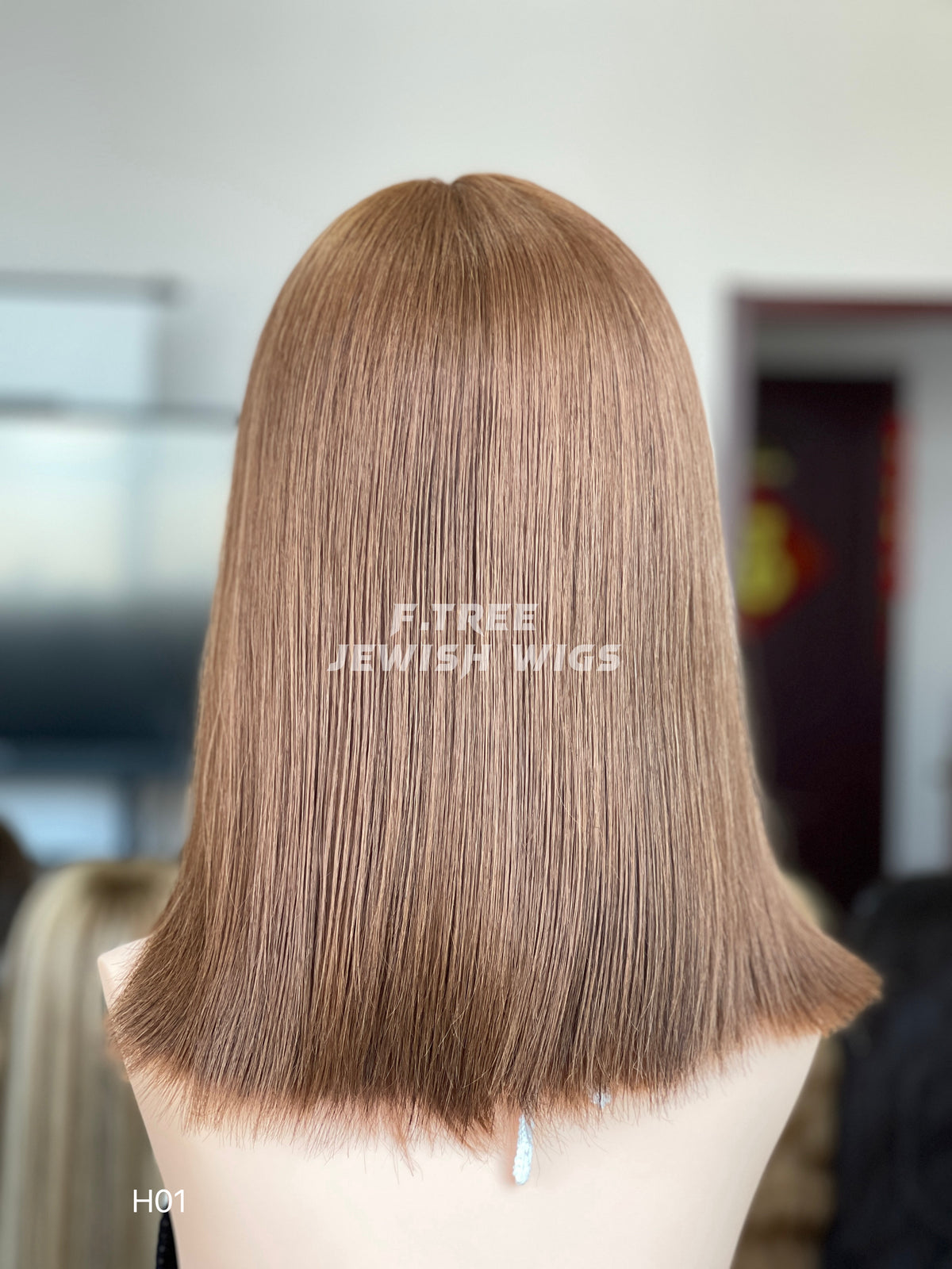 Light copper brown straight human hair sheitel wig, back length view