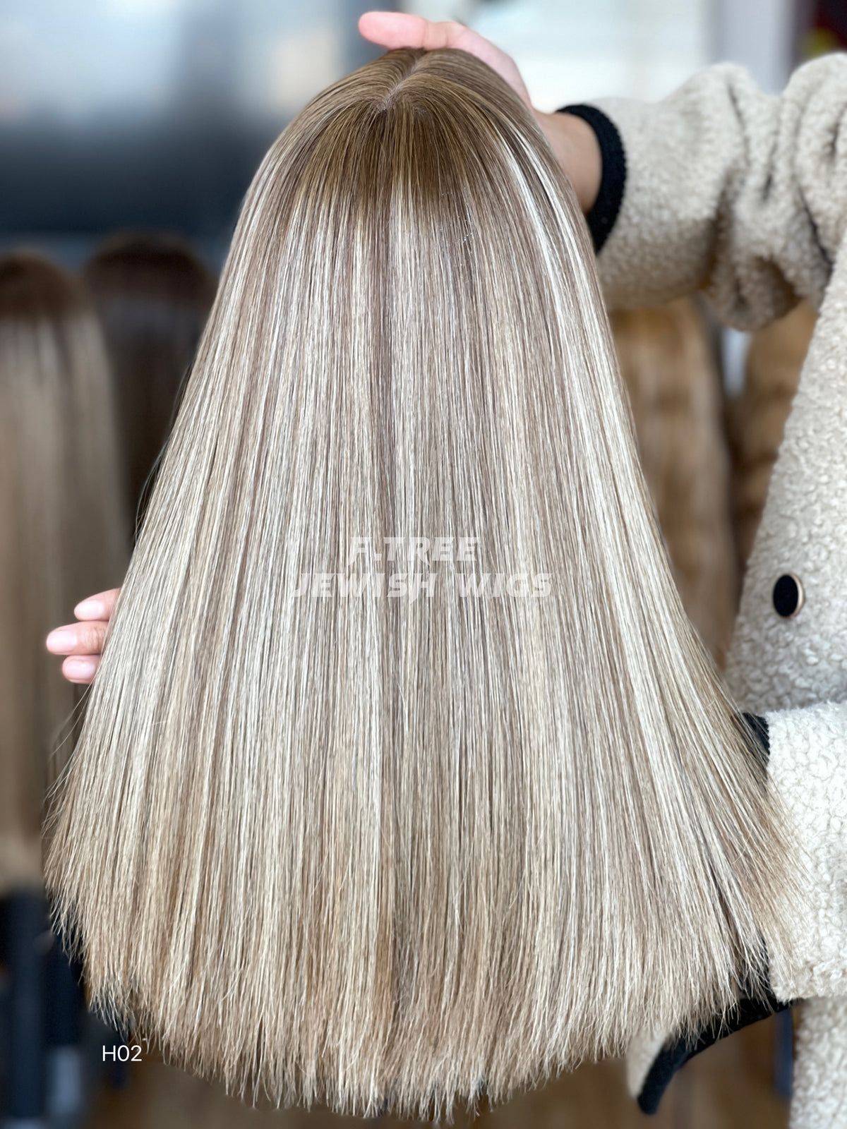 Cool ash blonde straight human hair sheitel wig, back view