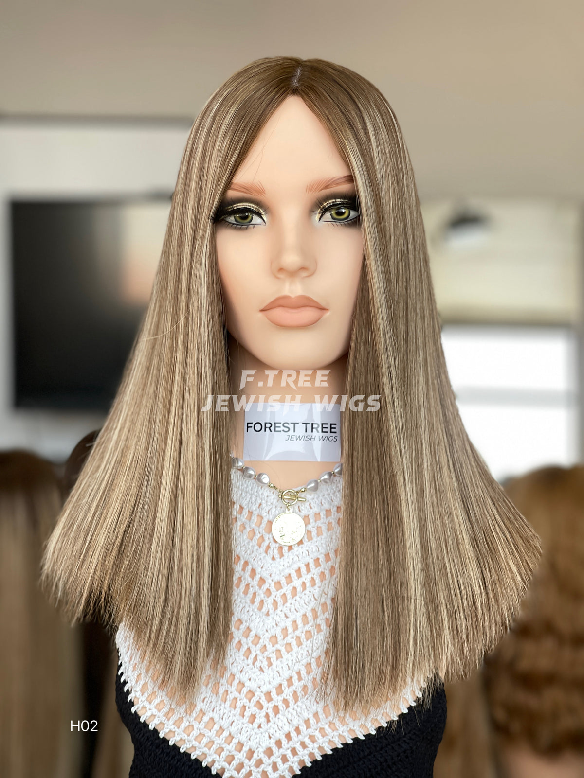 Cool ash blonde middle-part straight human hair sheitel wig, front view