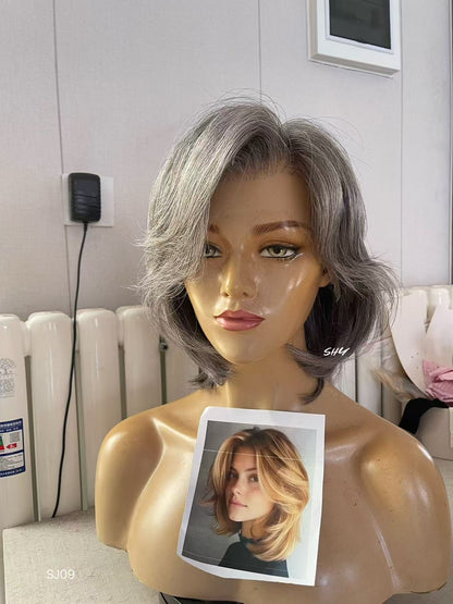 PU Full Lace Salt-and-Pepper Silver Gray Side-Part Layered Pixie Bob Human Hair Medical Wig front or three-quarter view