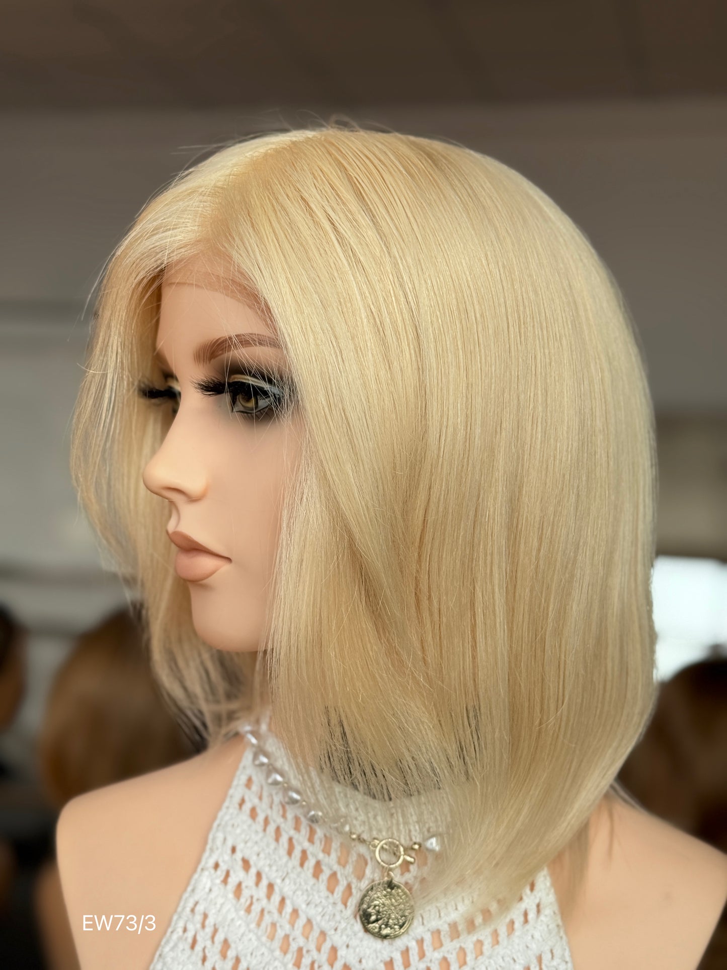 Light champagne blonde European human hair mono top medical wig - left profile