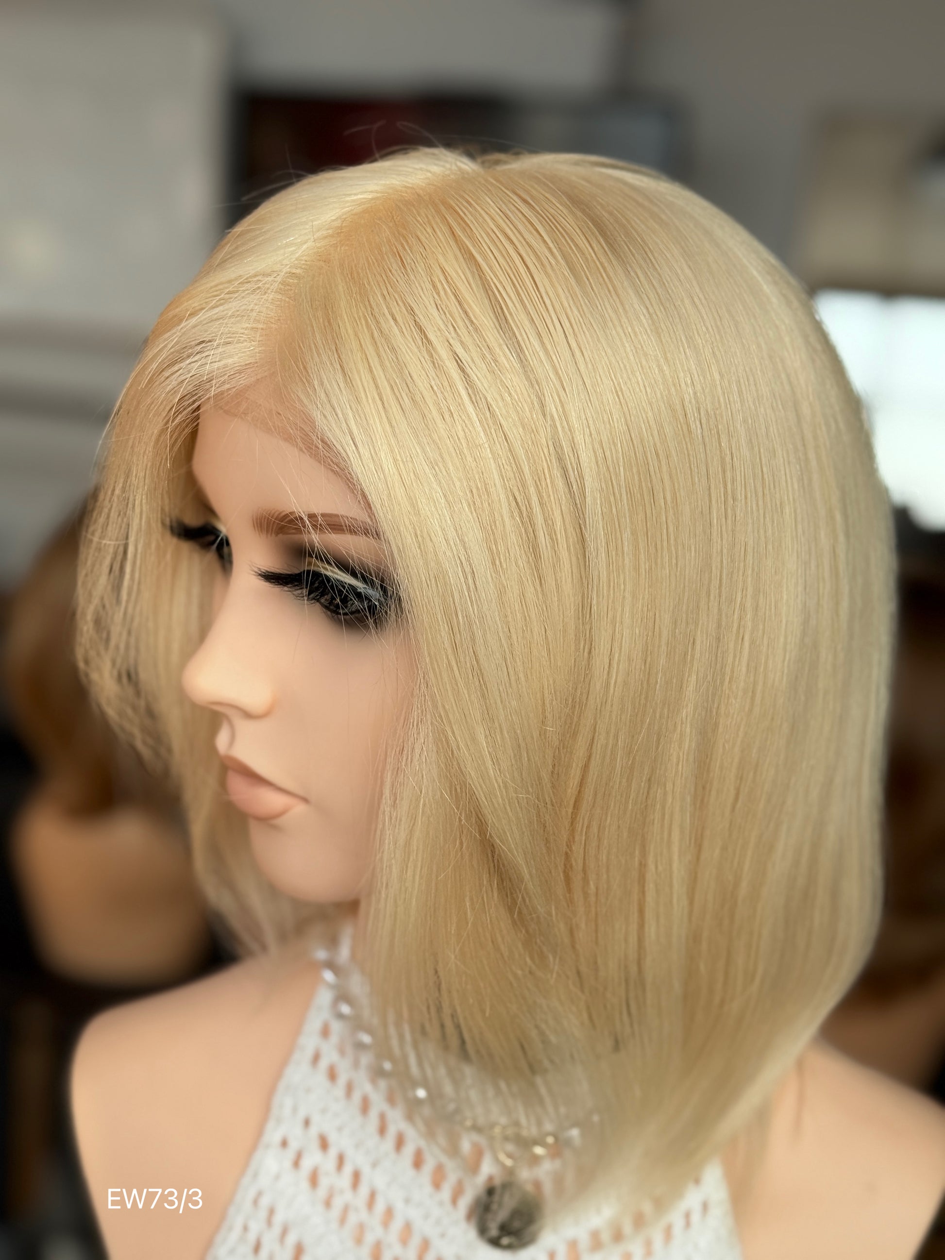 Light champagne blonde European human hair mono top medical wig - left three quarter