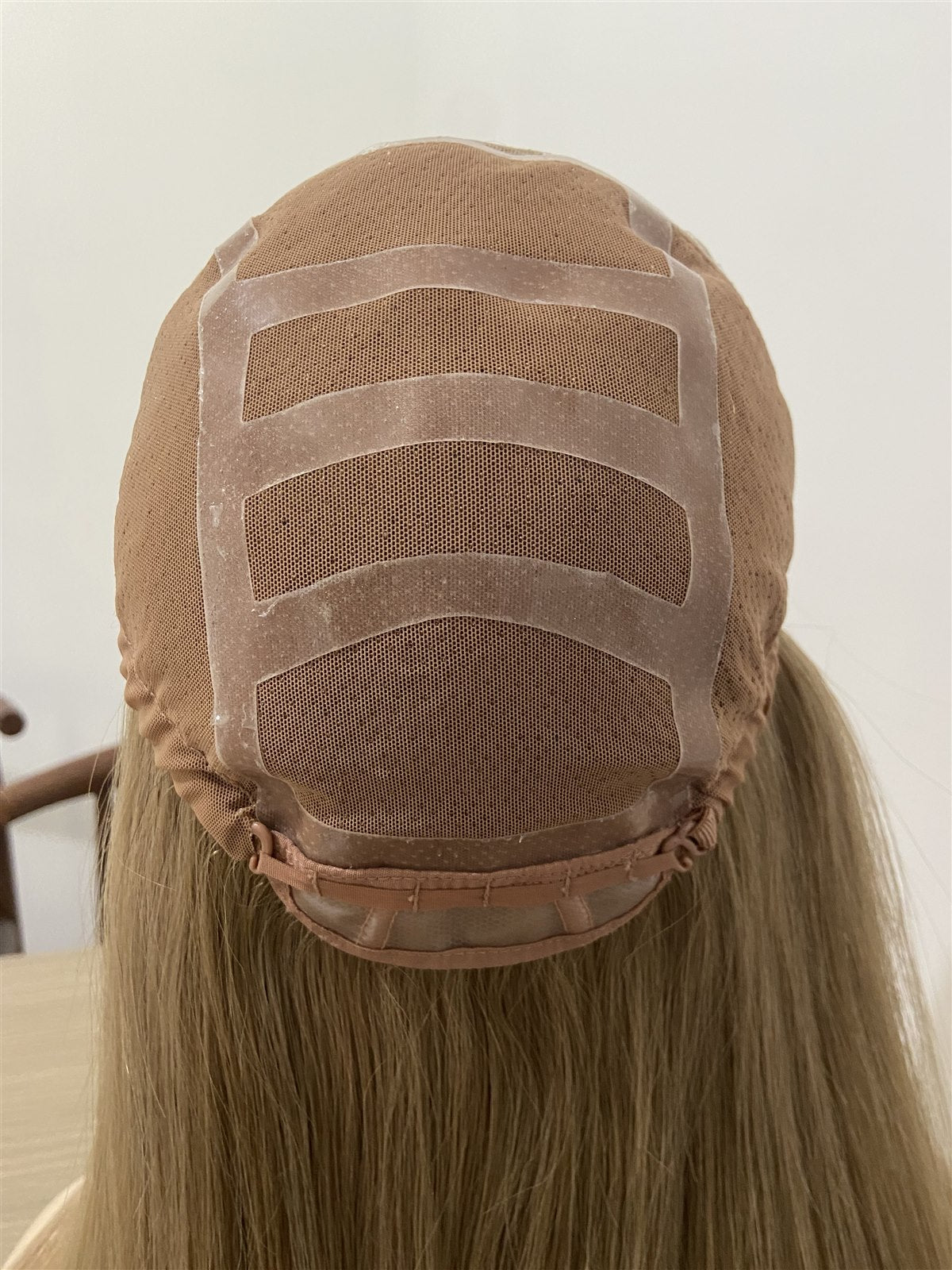 Rear view of a SHY full hand-tied medical wig cap with integrated silicone grip zones