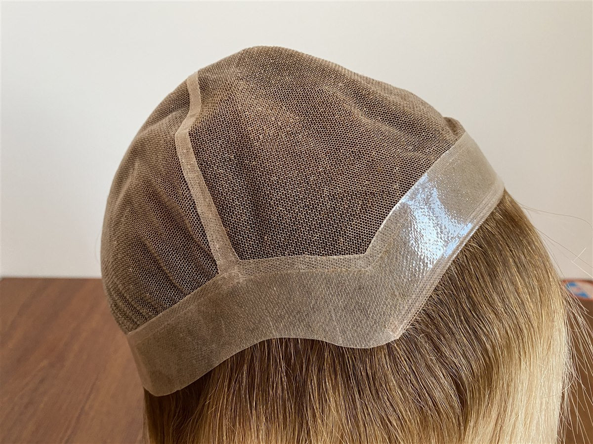 SHY full lace medical wig cap showing a wide PU perimeter around the cap edge